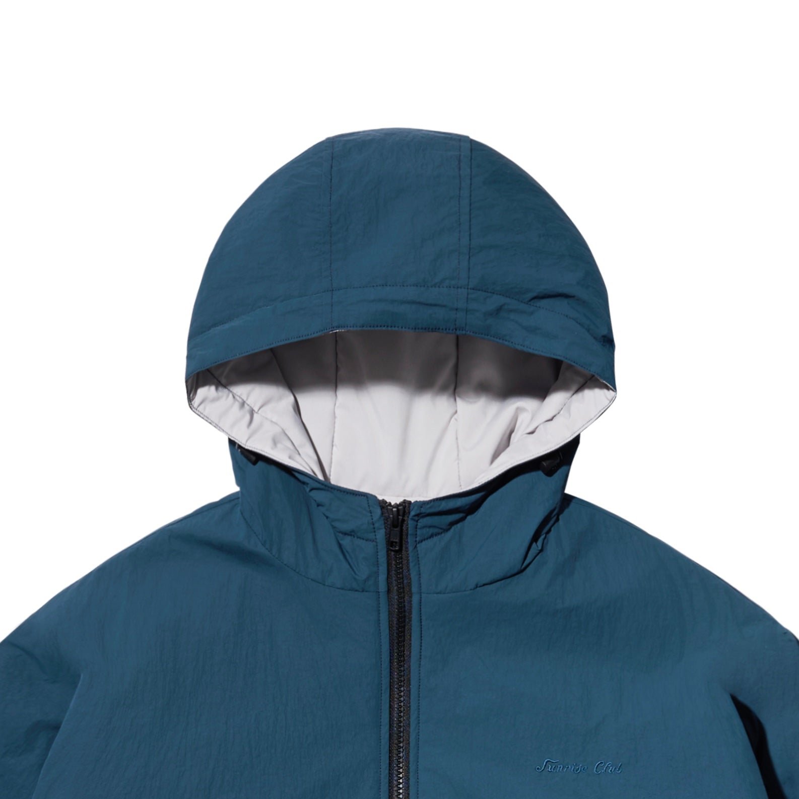 A close-up of a hooded jacket in a muted teal-blue color, featuring a black front zipper and a light gray interior lining on the hood, shown against a plain white background.