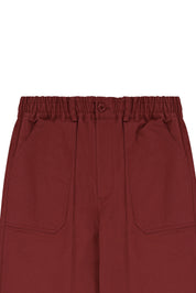 red pants with an elastic waistband on a white background