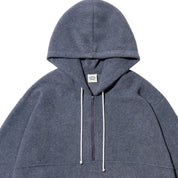 A dark gray half-zip hoodie with white drawstrings and a small white brand label on the chest, shown against a plain white background.