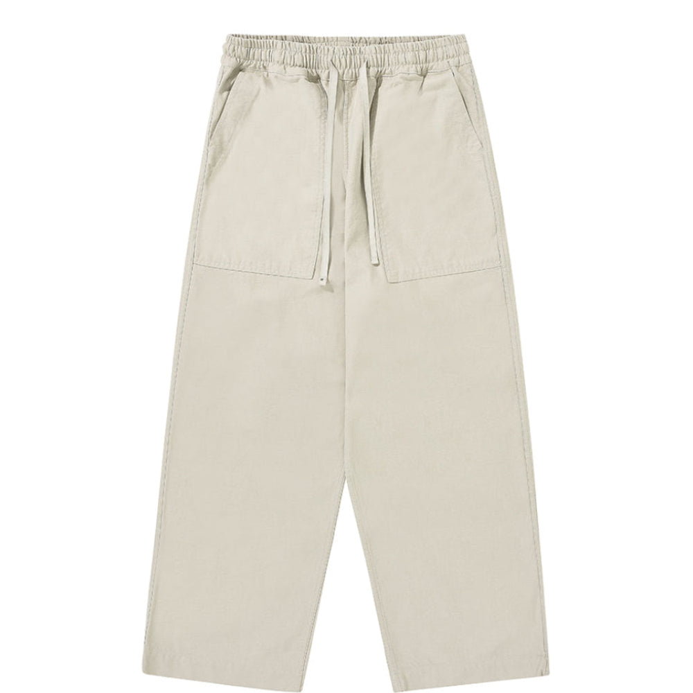 Beige pants with drawstring waist on a white background