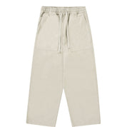 Beige pants with drawstring waist on a white background