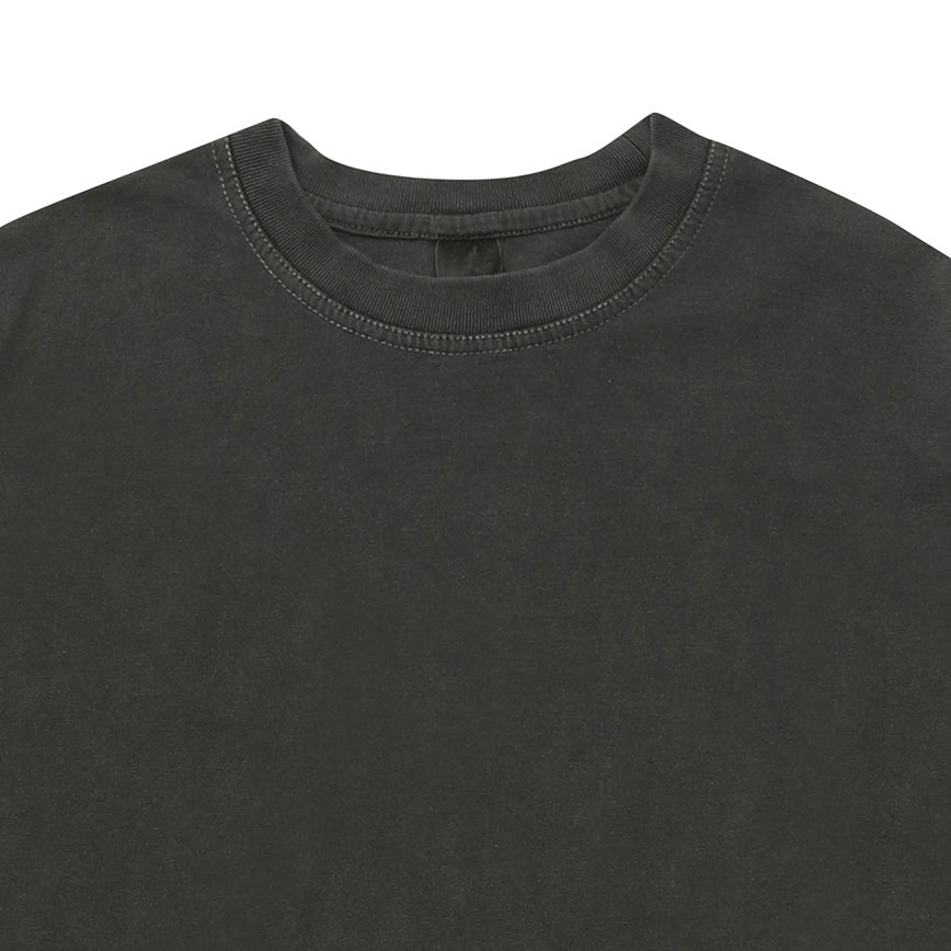Close-up of a dark grey t-shirt with a plain background