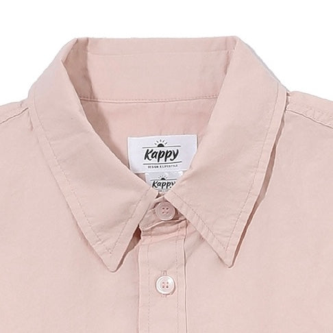 Close-up of a beige shirt collar with a Kappy label.