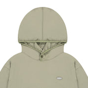 Light green hooded jacket with a brand logo on a white background