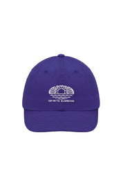 Purple cap with a "infinite sunshine' logo embroidered on the front on a white background