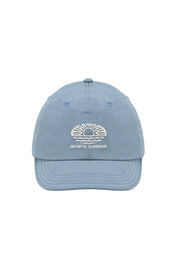 Light blue cap with "infinite sunshine" embroidery on the front on a white background