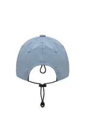 rear view of a light blue cap showing toggle and string to adjust the hat fit
