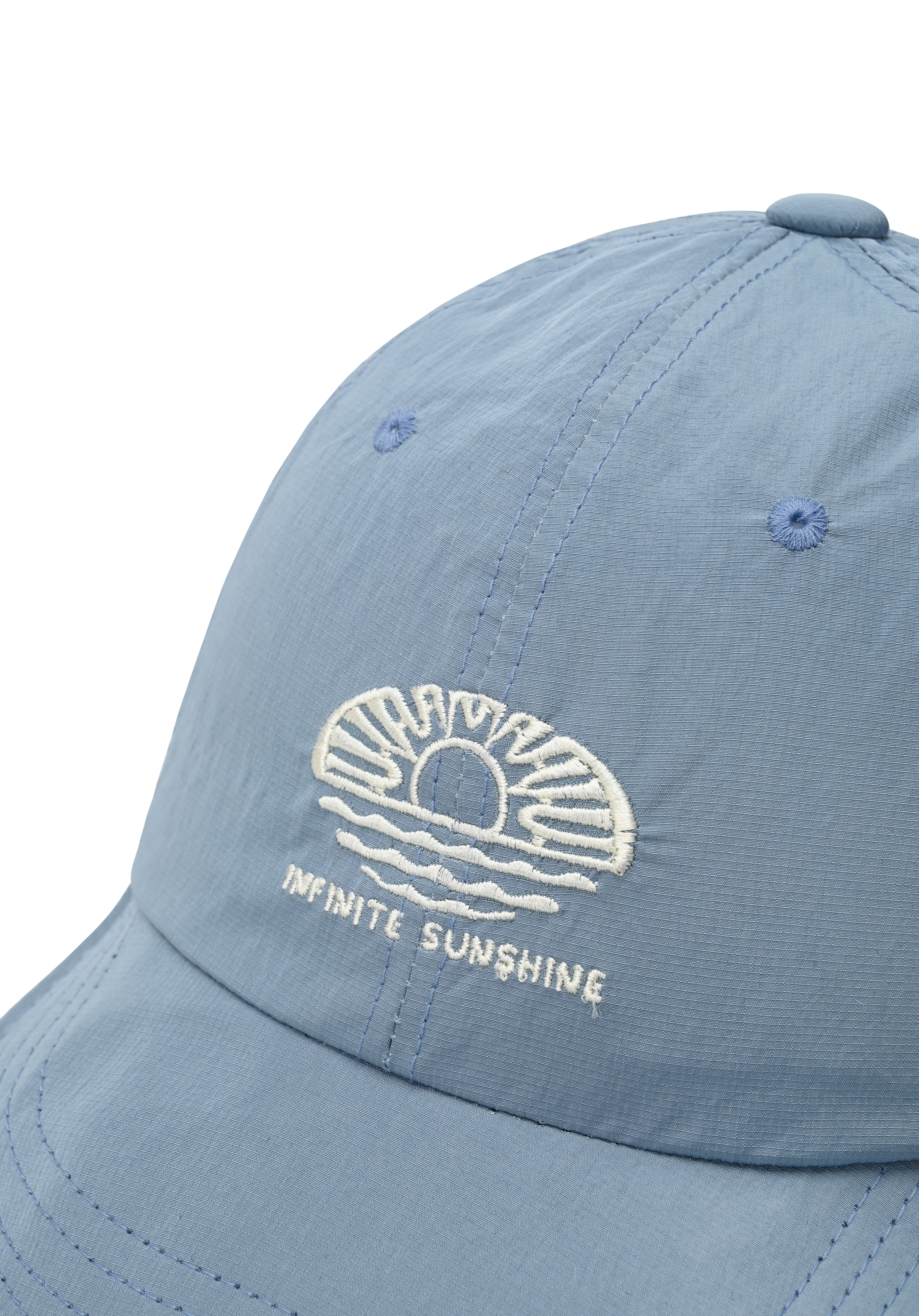 Zoom up of  light blue cap with "infinite sunshine" embroidery on front 