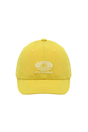 Yellow cap with a white  embroidery "infinite sunshine" on a white background