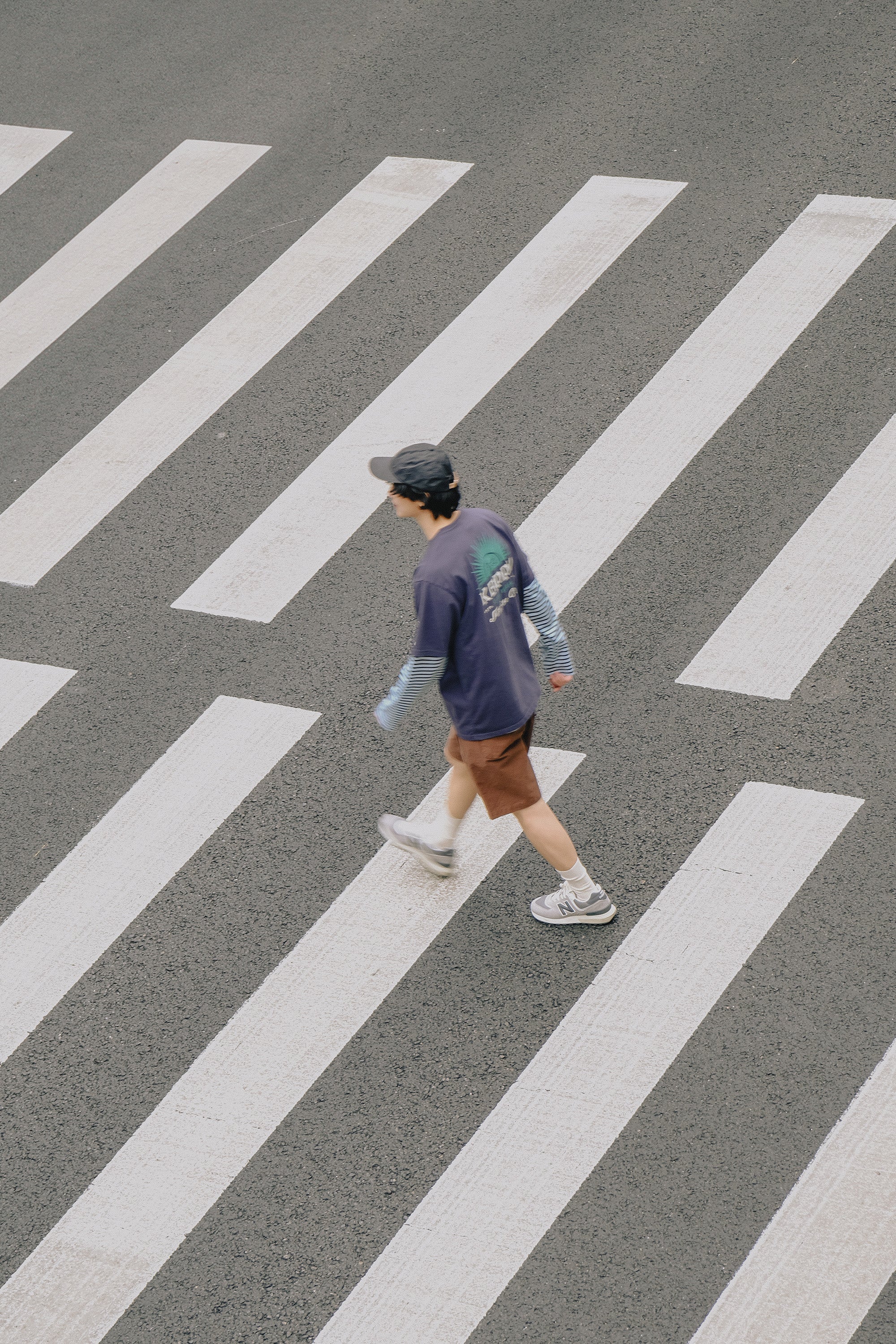 Person walking on a crosswalk