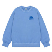 Light blue sweatshirt with a logo on a white background