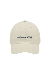 Beige cap with 'Sunrise Club' embroidery on a white background