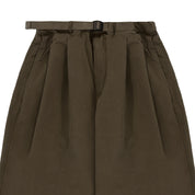 Brown pleated skirt with a belt on a white background
