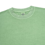 Green t-shirt with a brand logo on a white background